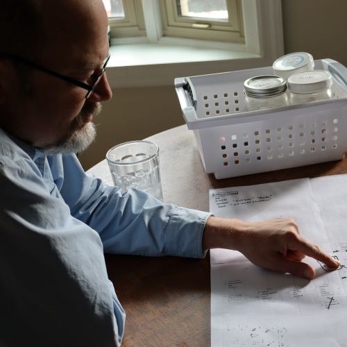 Eric reviewing garden planning notes